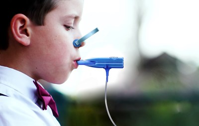 child breathing through circuit